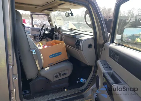 2003 Hummer H2 z USA, uszkodzony, nr VIN 5GRGN23U33H132653